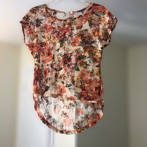 VOICE size large. Lace floral top. High low